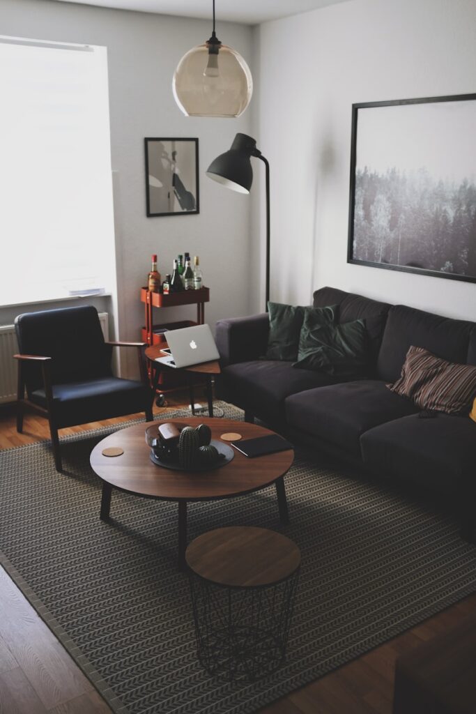 black book on brown wooden coffee table